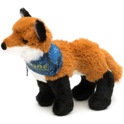 A fox plush toy of Dawn, leader of the nocturnal brigade, who is wearing the group’s iconic blue scarf around her neck. 